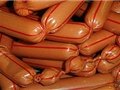 На открытии нового мясокомбината в Екатеринбурге Россель перерезал ленту из сосисок